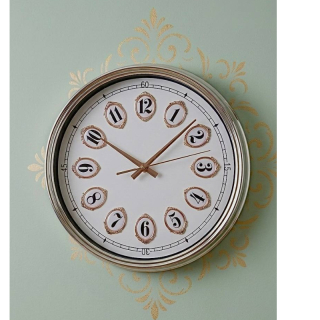 Oval badge wall clock