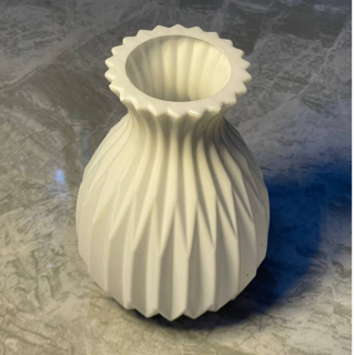 White fluted flower vase